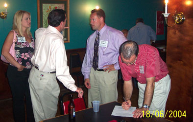 Amanda listens in as her husband, Billy, chats with Mark