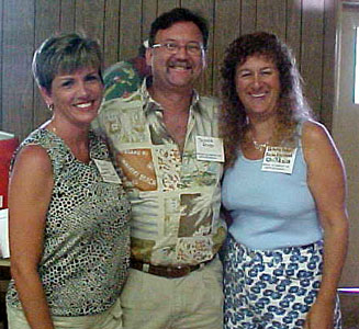 David, his wife, Pam, and Nancy strike a pose for Prudhomme